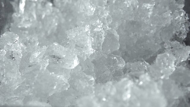 Crushed ice texture forming a refreshing frosty background, a natural winter element for cold drink concepts