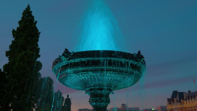 Victoria, British Columbia, Canada &ndash; July 2, 2026: Illuminated Legislative Assembly fountain at night
