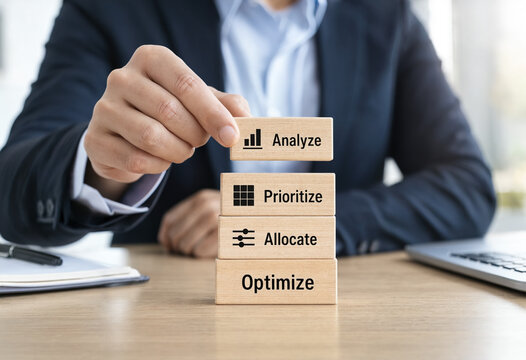 Business professional stacking wooden blocks with words Analyze Prioritize Allocate Optimize for strategic planning and management transparent background