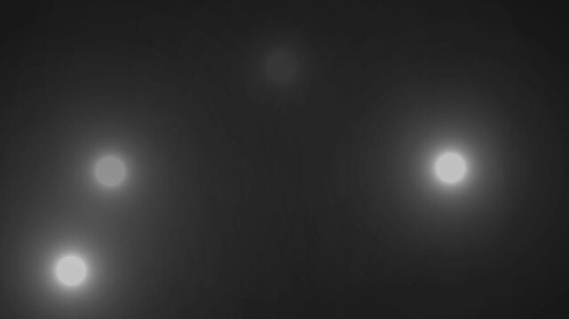 Paparazzi camera flashes, blinking flashlights animation on black background.The scene of thousands of cameras taking pictures.The concept of popularity- Flashing lens flares seamless looping.