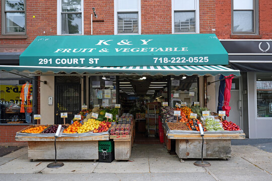 New York City, old fashioned local grocery store selling fresh fruit and vegetable