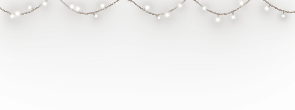 White Christmas lights with a white cable, isolated over a transparent background. 3D render.
