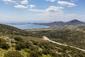 Fototapeta premium The lush island of Antiparos in Greece seen from a little higher up on a sunny day in the spring.