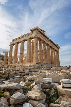 The ruins of the historic and ancient Parthenon temple on the Acropolis hill in Athens, Greece, on a sunny day. It's a UNESCO World heritage site.