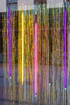 Colourful Retro Neons Light Sticks in Window