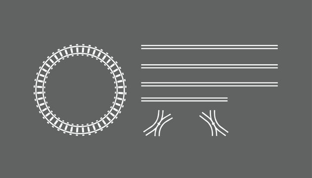 Schematic white line drawing of railway tracks including a circular loop and straight line switches on grey.