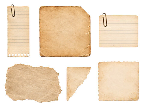Collection of aged paper pieces with clips isolated on transparent.