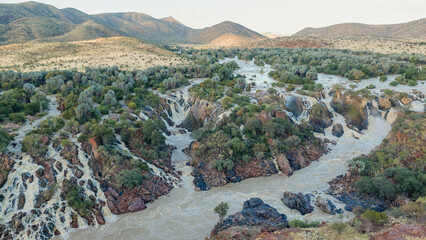 Epupa Falls aerial view showing cascade waterfalls and Kunene River © EDER