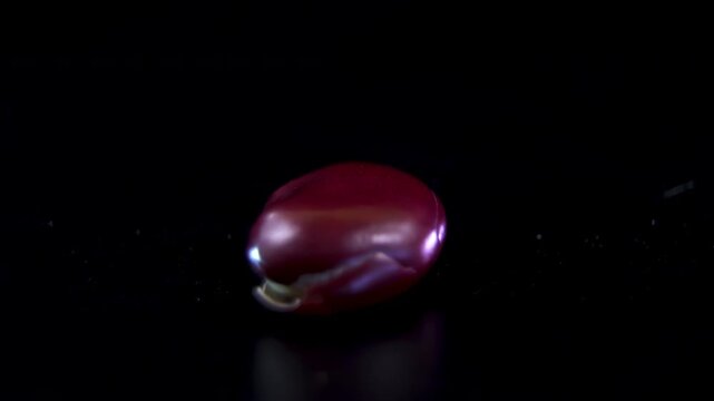 Raw red kidney bean Phaseolus vulgaris, rotating rich antioxidant ingredient in herbal medicine product design for holistic health, cinematic macro top light 