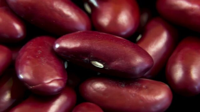 Detailed close up of rotating red kidney beans group, perfect food footage for alternative plant-based protein, dietary fiber and holistic nutrition concepts 