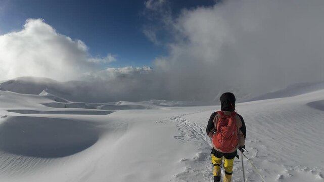 Mountaineering Across Vast Snowfield On Huayna Potosi Glacier In Bolivia Above The Clouds
