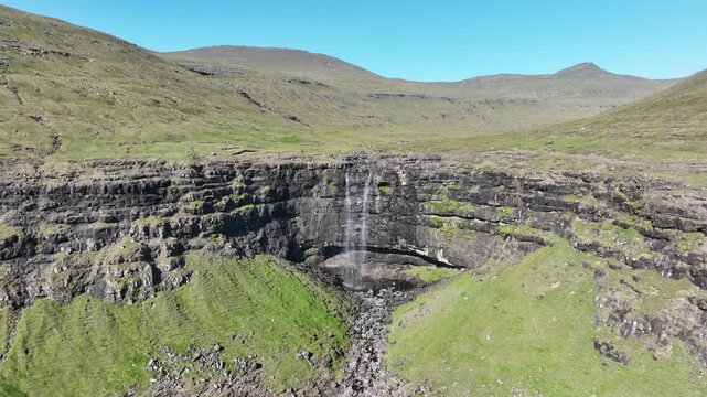 Drone shot of Foss&aacute; waterfall in Faroe Islands