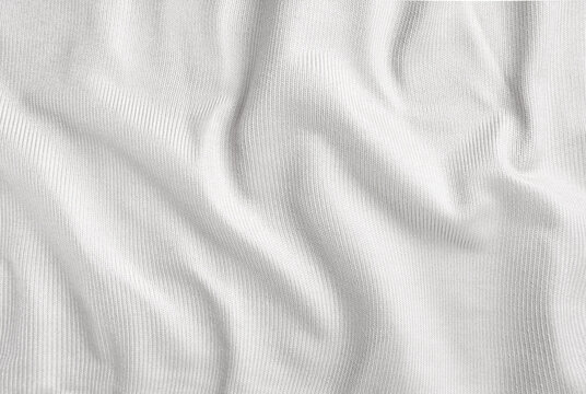 Wrinkled texture of white cotton fabric