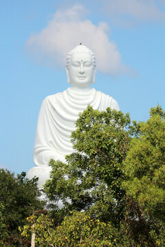 NHA TRANG, VIETNAM: The majestic giant White Buddha statue sitting in meditation on a lotus pedestal at Long Son Pagoda.