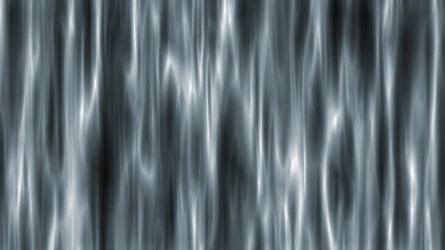 Abstract shimmering silver tinsel foil fringe curtain sways gently background
