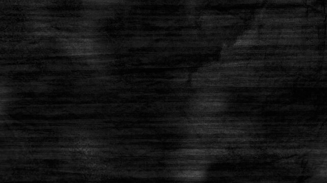 dark grunge wood texture showing an eerie abstract concrete wall background with a moody atmosphere
