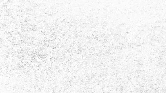 minimalist white textured wall under bright cinematic studio light creating a subtle abstract background