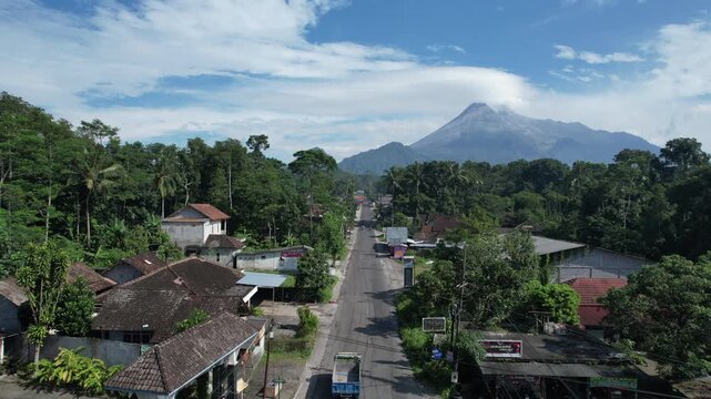 Majestic Merapi Volcano Peaks with Early Morning Clouds