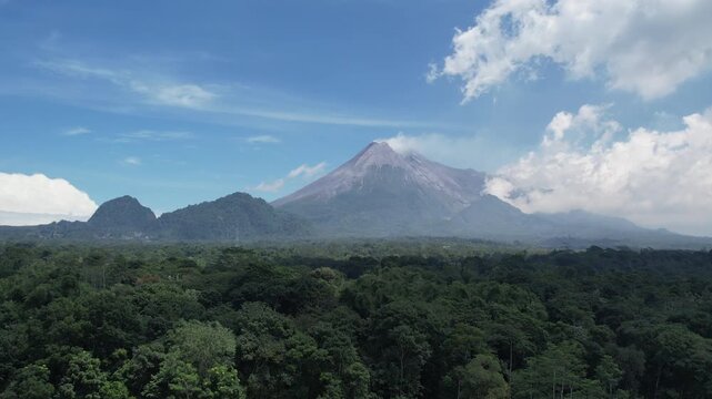 Majestic Merapi Volcano Peaks with Early Morning Clouds