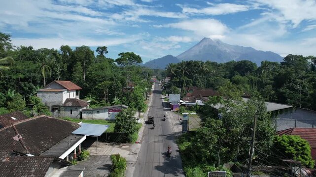 Majestic Merapi Volcano Peaks with Early Morning Clouds