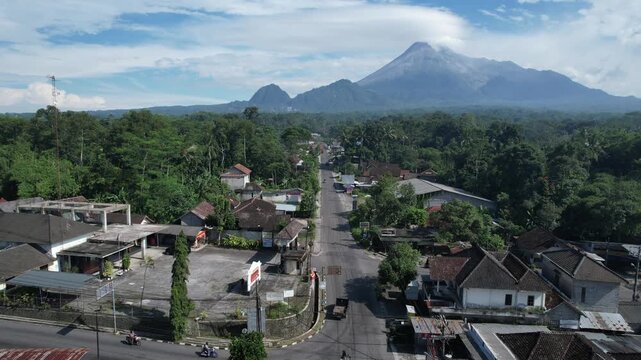 Majestic Merapi Volcano Peaks with Early Morning Clouds