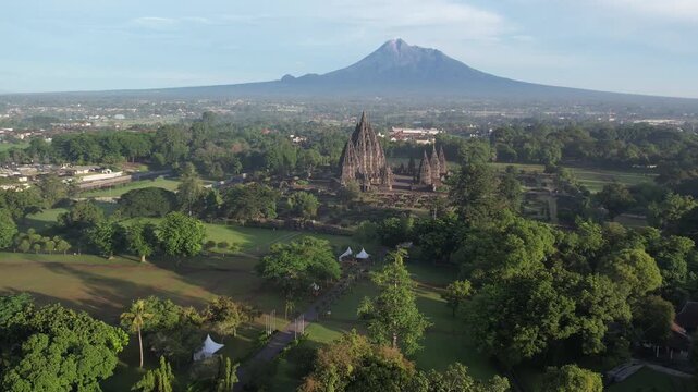 Prambanan Temple with Merapi mountain view, ancient Hindu architecture in Yogyakarta, Indonesia.