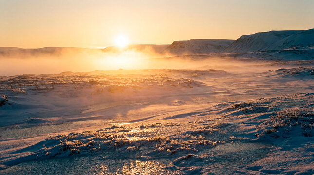 Frozen tundra bathed in golden mist and low light at arctic sunrise