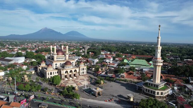 Aerial of Al Aqsha mosque islamic center in Klaten, Indonesia. with merapi mountain background