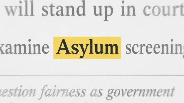 Highlighted asylum headline in newspaper headline text showing global immigration politics, refugee policy and asylum seeker reporting. 