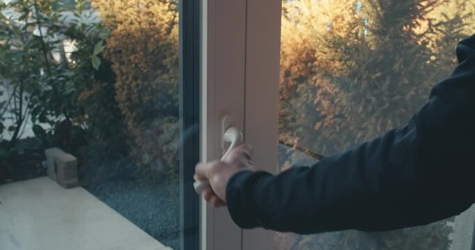 close-up switches man turns off light closes window leaves room and closes door. safety rules When leaving home. storage of electricity heat, saving on costs. techniques for reducing electricity costs