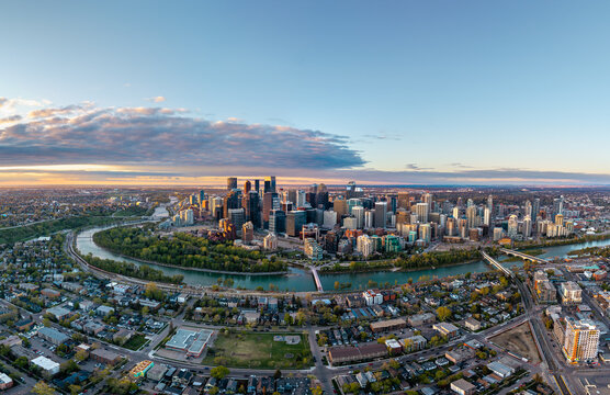 Calgary skyline panorama with Bow River at sunrise