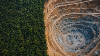 Fototapeta premium Aerial View of Resource Extraction Next to Rainforest