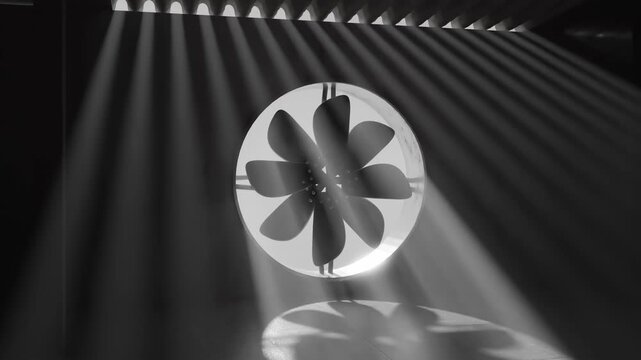 3D Animation of a concrete garage with a rotating turbine bathed in beams of light