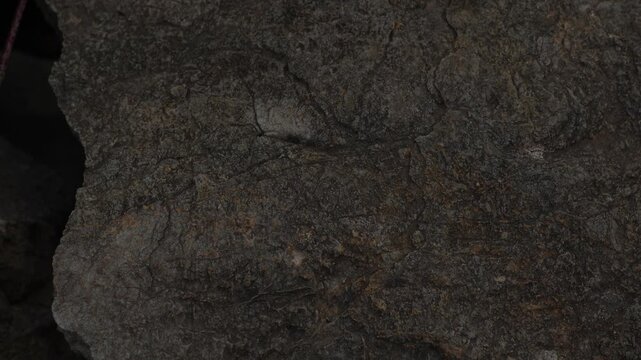 Varied Texture and Hole in Stone Surface. 
