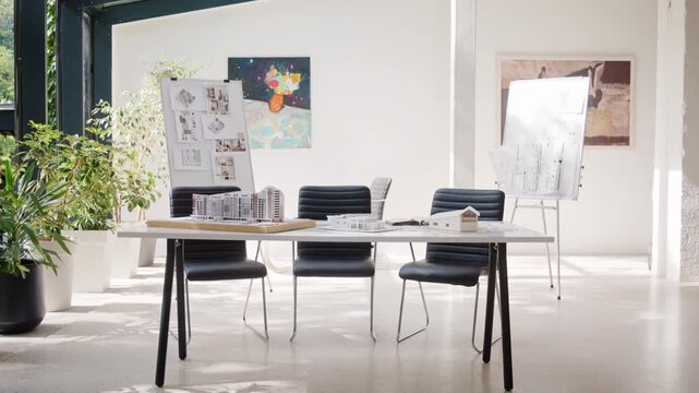Bright modern architectural bureau with minimalist meeting area
