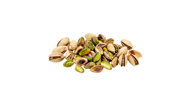 A small pile of roasted pistachio nuts in their shells, some partially opened, isolated on a solid black background, for food