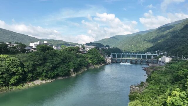 Aerial View of Ikeda Dam and Yoshino River on a Summer Morning in Tokushima, Japan
