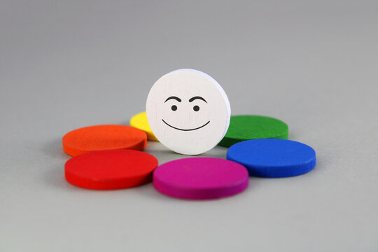 Happy at the center of a color wheel, primary, secondary, analogous and complementary colors