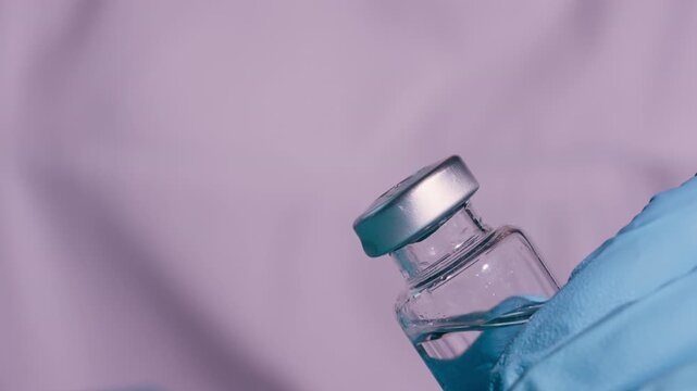 Medical disinfection, Healthcare professional sanitizing a medication vial