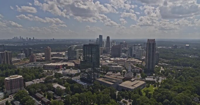 Atlanta Georgia Aerial v686 fly through shot of park and skyscrapers during bright daytime - DJI Inspire 2, X7, 6k - August 2020