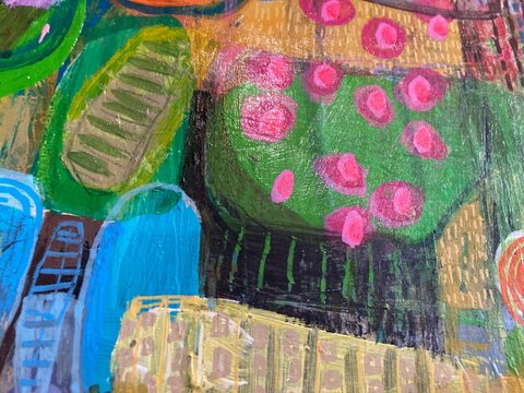 Abstract painting with pink polka dot pattern on green and gold