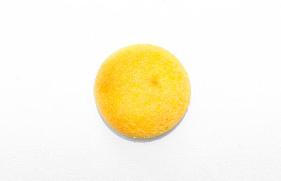 Delicious pineapple jam filled cookies isolated on white background. Golden round biscuit with sweet pineapple filling