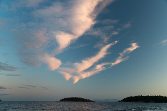 Canada, BC, Sunshine Coast, Sechelt.  Enigmatic cloud formation over the Strait of Georgia.
