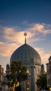Beautiful mosque dome with intricate tile patterns at sunset