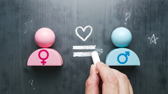 Concept image of gender equality, love and mutual respect. Hand drawing equal sign and heart between male and female symbols.