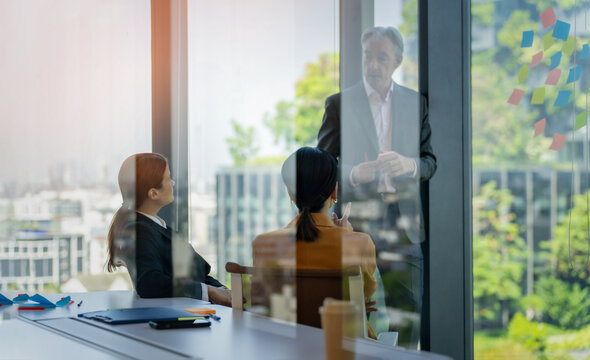 Team, people and laptop for business meeting in corporate as consultant in accounting firm or bank in office. Business ans success concept, team working together.