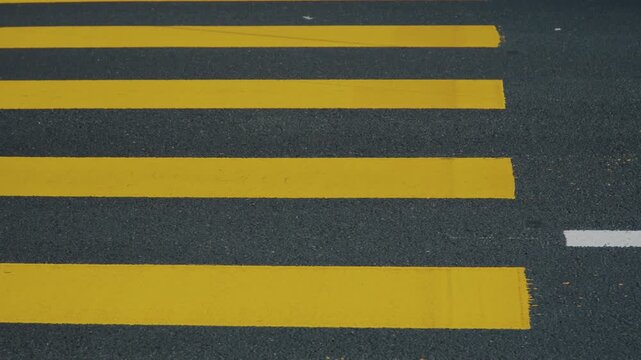 Cars passing yellow crosswalk in seoul south korea
