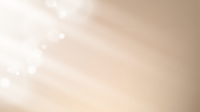 Elegant abstract beige background with soft diagonal light rays and gentle bokeh effects, luxury corporate presentation banner or clean web design backdrop