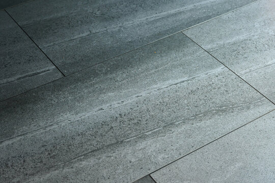 modern grey stone  pavement floor tile suitable for architecture background