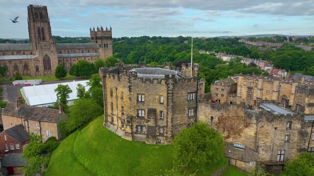 Durham Castle is a Norman style castle in the historic city center of Durham, England, UK. The Durham Castle and Cathedral is a UNESCO World Heritage Site since 1986. 